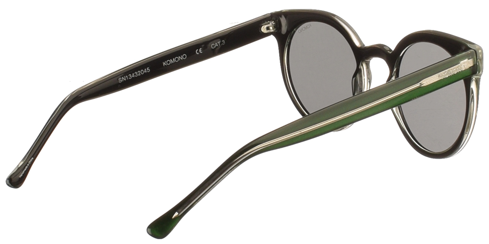 Στρογγυλά γυναικεία κοκάλινα γυαλιά ηλίου Lulu σε πράσινο σκελετό και επίπεδους σκούρους γκρι φακούς της εταιρίας Komono για μικρά και μεσαία πρόσωπα.