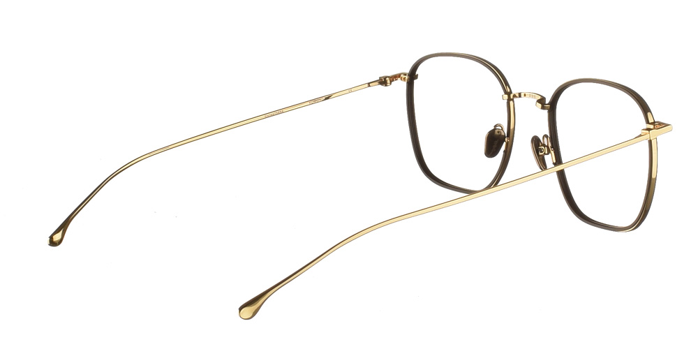 Τετράγωνα χρυσά μεταλλικά ανδρικά και γυναικεία γυαλιά οράσεως Oscar Gold Black με μαύρες κοκάλινες λεπτομέρειες  της εταιρίας Komono για μεσαία και μεγάλα πρόσωπα.
